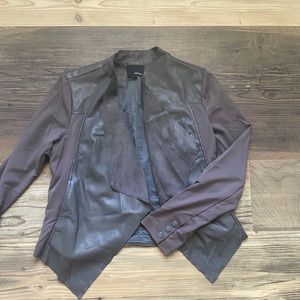 Mixed materials asymmetrical jacket